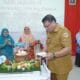 Pemotongan tumpeng oleh Sekretaris Daerah Kota Tidore Kepulauan.
